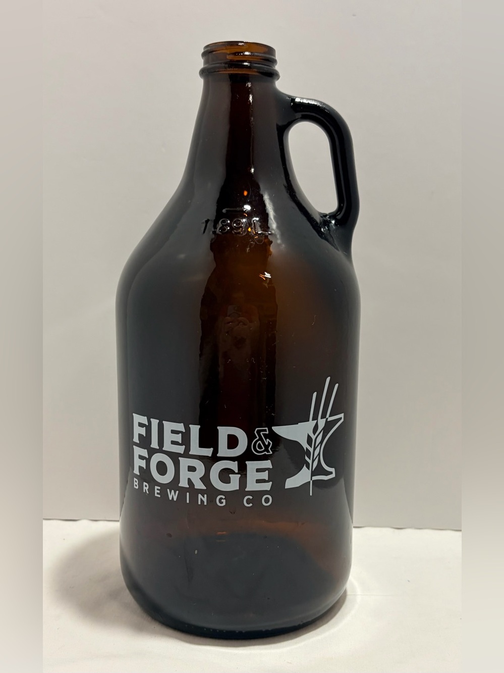 Field & Forge Brewing Company Amber  Glass Beer Growler